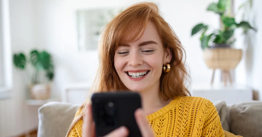 Happy woman with phone